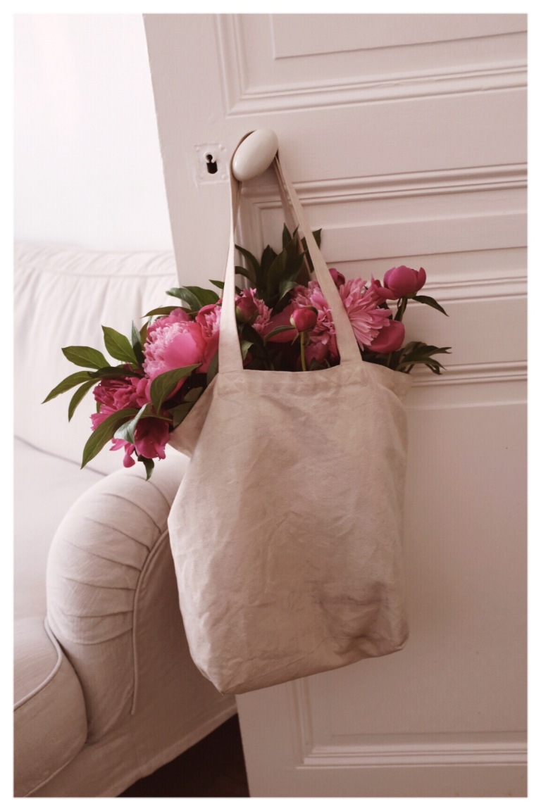 Peonies in tote bag from market by Crissa Youngblood